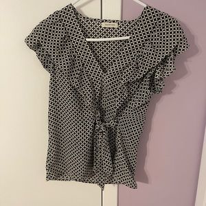 White and black patterned blouse